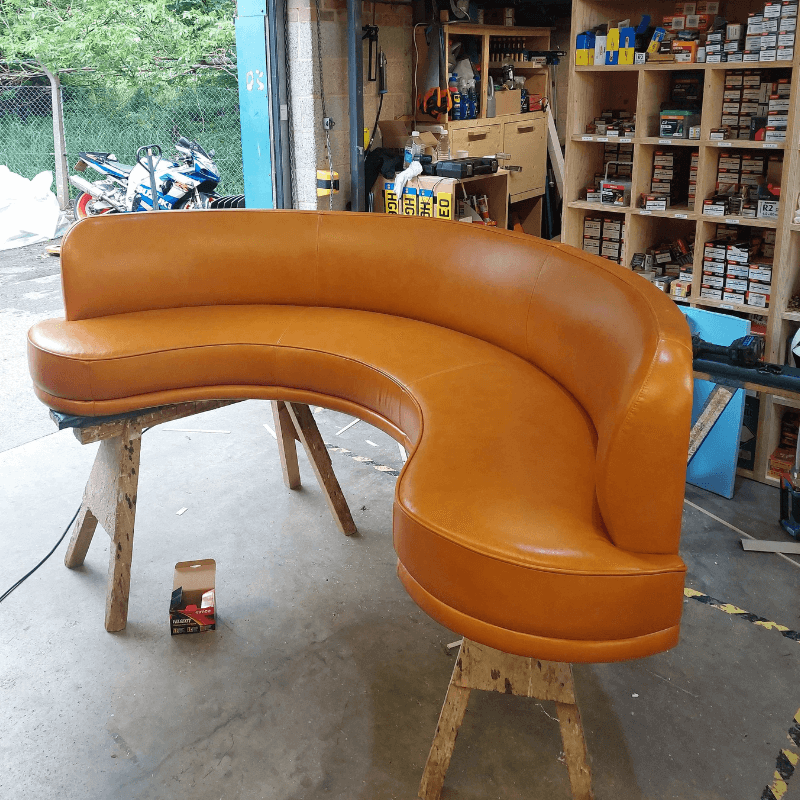 The Park Queensway London c shaped leather banquette